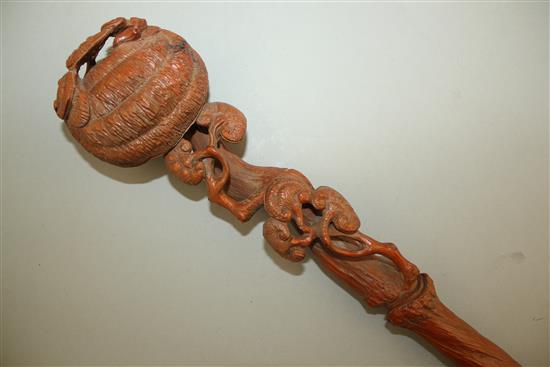 A Chinese carved wood ruyi sceptre, 35cm